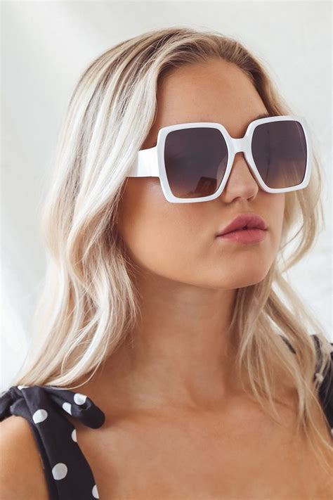 white oversized sunglasses.